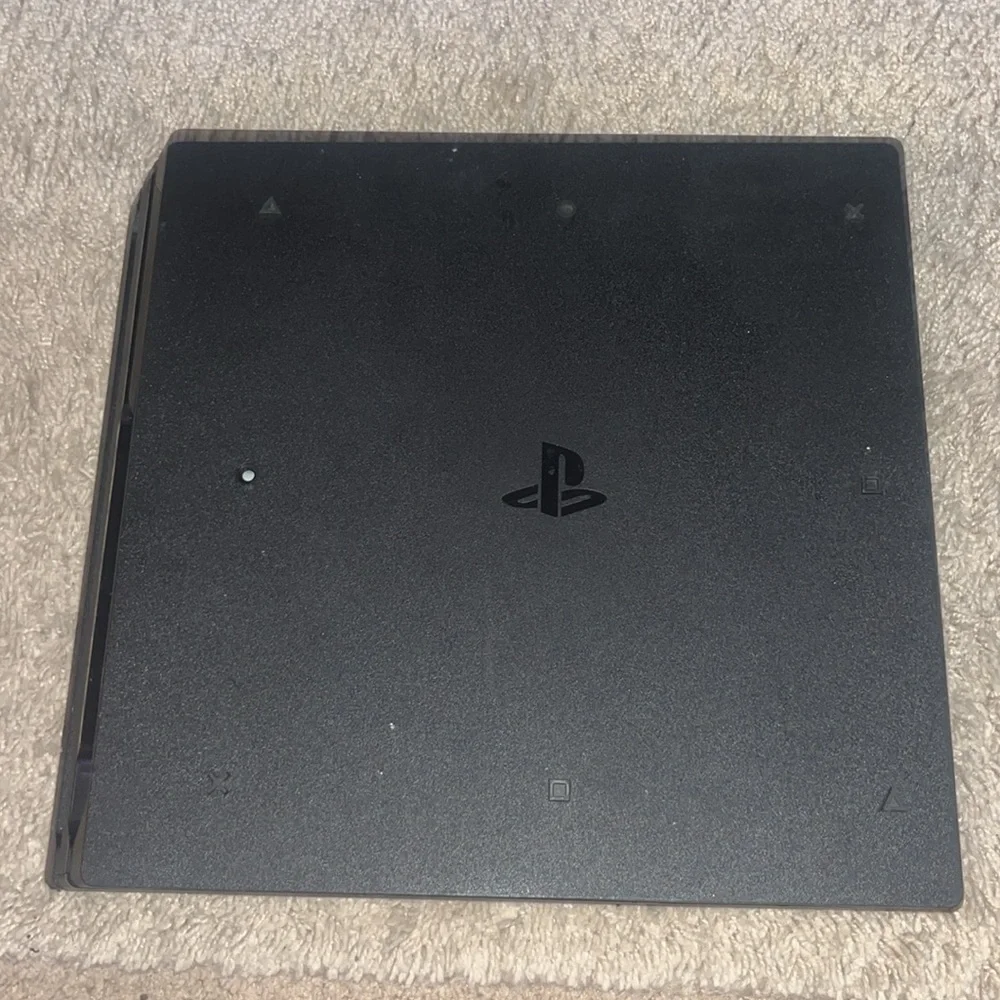 This is a PS4 in good condition it just is peeling a little bit on a cord